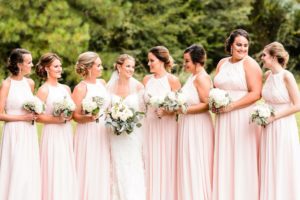 Bride and bridesmaids in blush dresses
