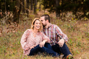 middle Georgia engagement session couple in field laughing