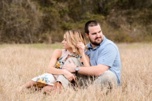 georgia engagement session in field at tryphenas garden georgia