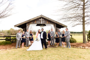 Middle Georgia Wedding, Plantation Farms wedding, bride and groom, wedding day, farm wedding, garden wedding, bridal party standing in field in front of barn 