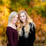 two young senior girls smiling outdoor portrait