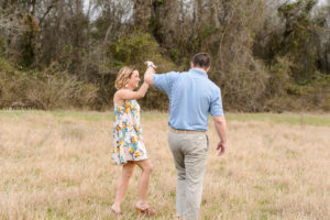 couple dancing in field tryphenas garden middle georgia engagement session