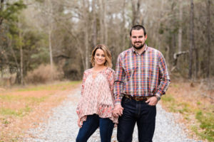 couple holding hands during middle georgia engagement session